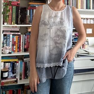 Elegant Gray Sleeveless Blouse with Floral Design